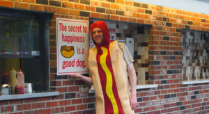 man in hot dog suit