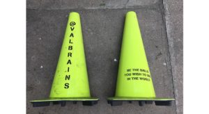 Traffic cones with custom writing.