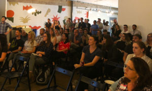 an audience of people in Austin watching our RuNT speakers