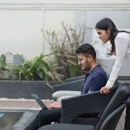 man and woman working outside